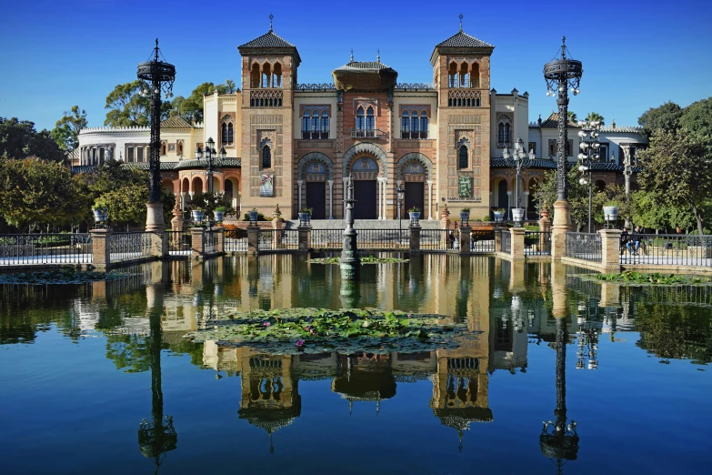 a large building has a lake in the middle of it