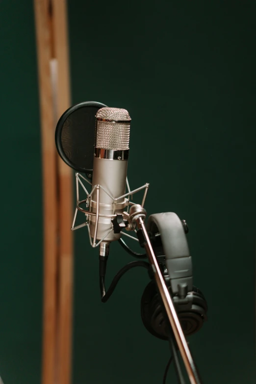 a microphone and two radio microphones with wires connected