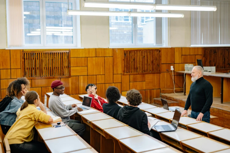 some people are sitting in a lecture hall