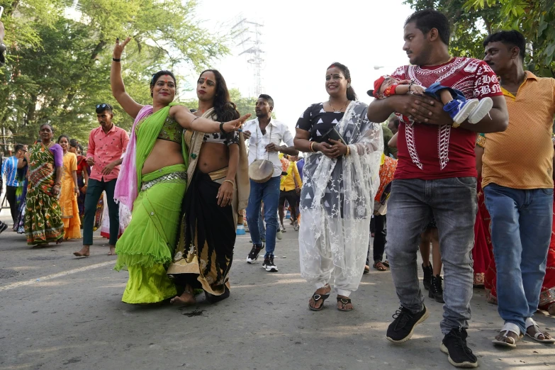 indian people dance and perform in the street
