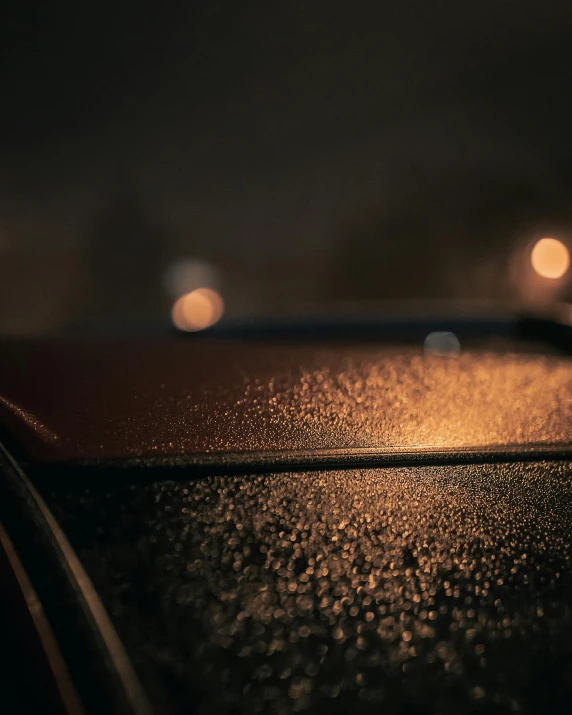 a closeup view of lights shining in the dark