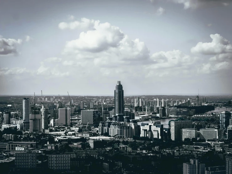 a view of a large city and the clouds