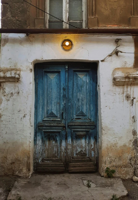 a doorway that has an interesting light on top of it