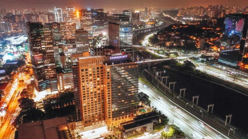 night time cityscape looking down at some roads and buildings