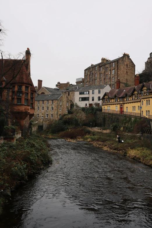 the bridge is surrounded by many older buildings