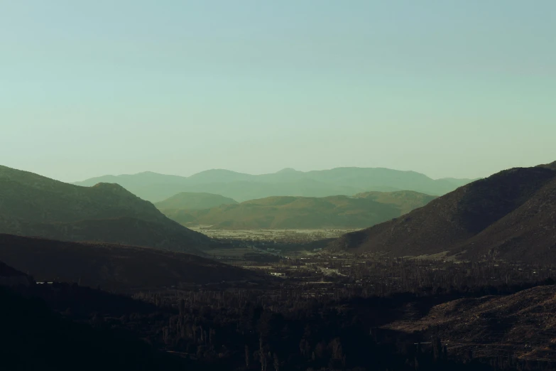 mountains and town nestled among them in the hills