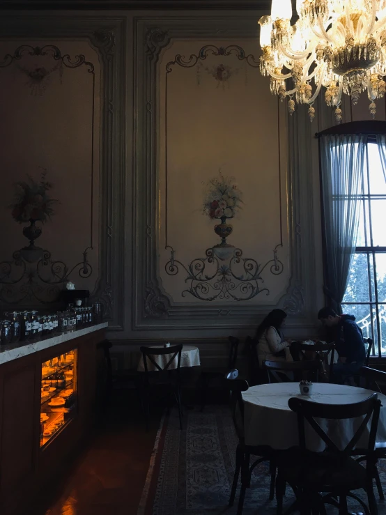 a table sitting in the middle of a dark room