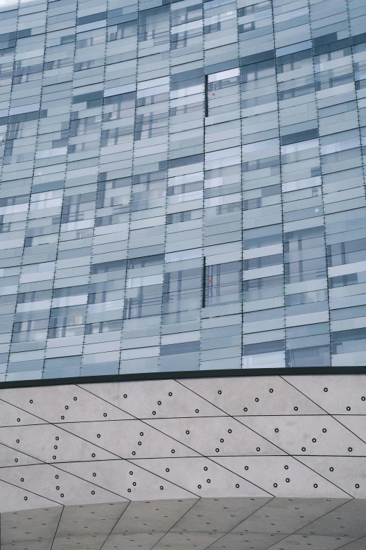 the roof of a building with an air plane flying overhead