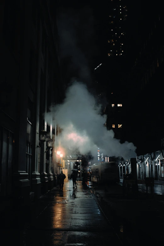 a person standing in front of a fire hydrant on a city street