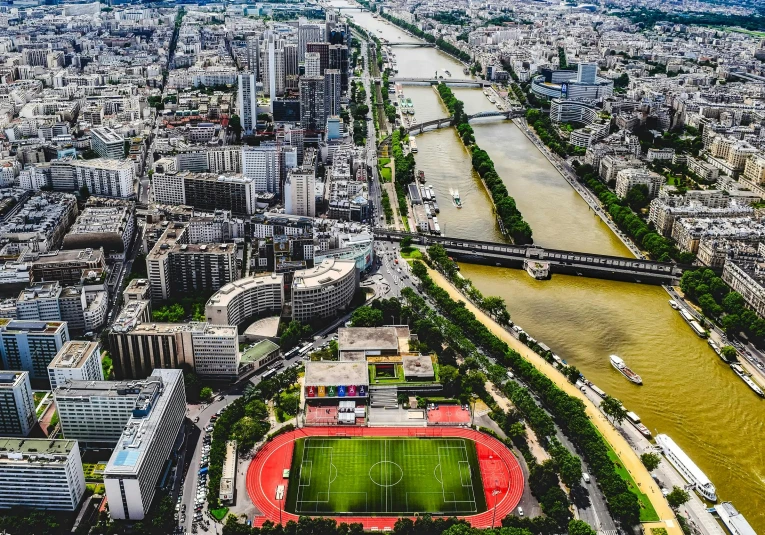 an aerial view of paris, including the river seine