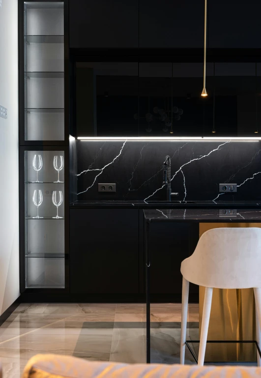 a kitchen scene is shown with focus on the counter top and cabinets