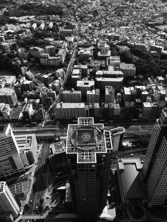 a black and white image of city buildings