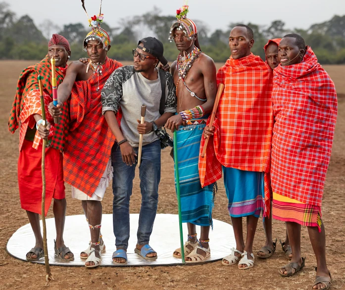 a group of african american men standing in a field