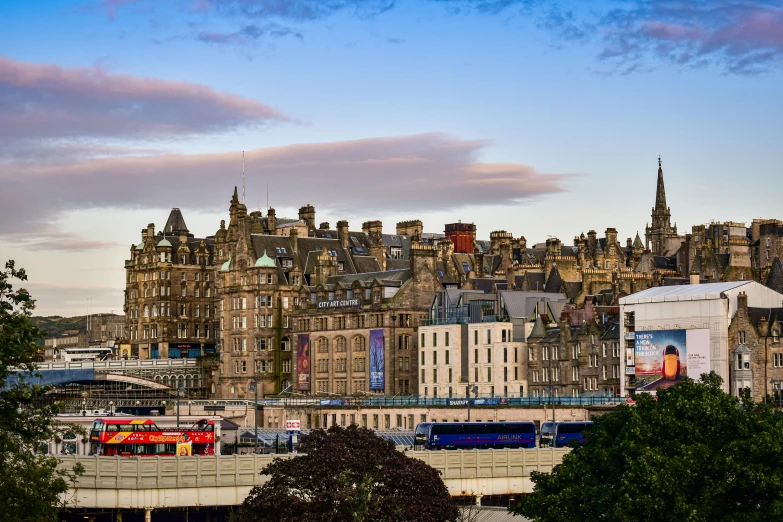 an image of a city skyline taken at dusk