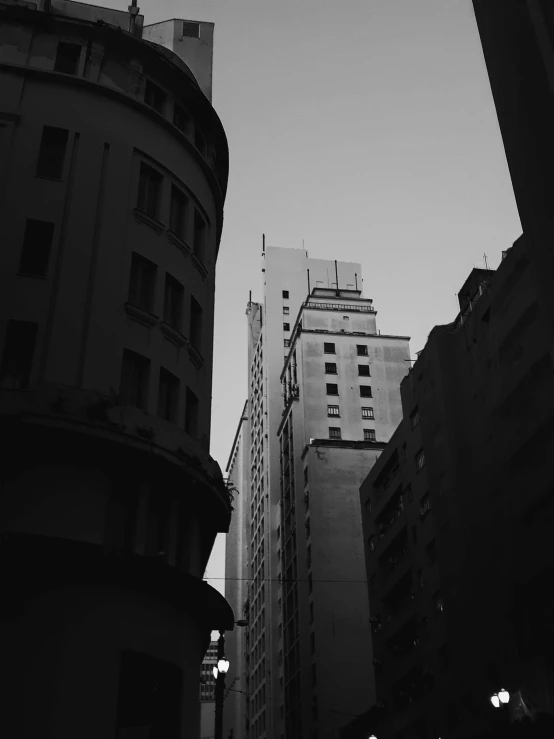 city buildings are shown against the blue sky