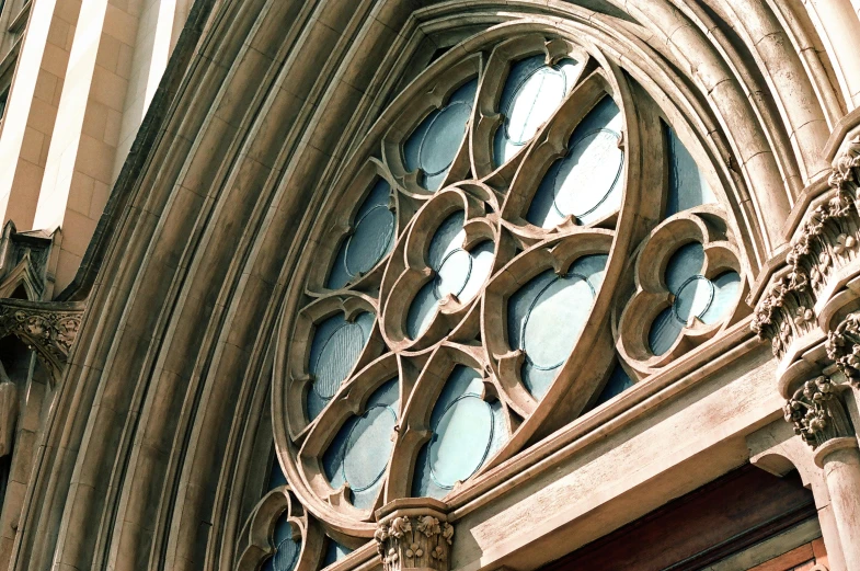 the large stained glass windows on the side of a building