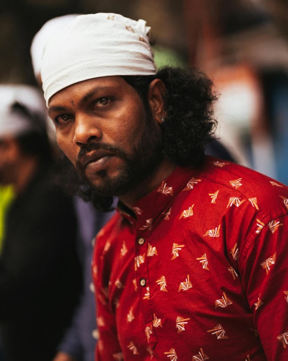 a man wearing a white turban on his head