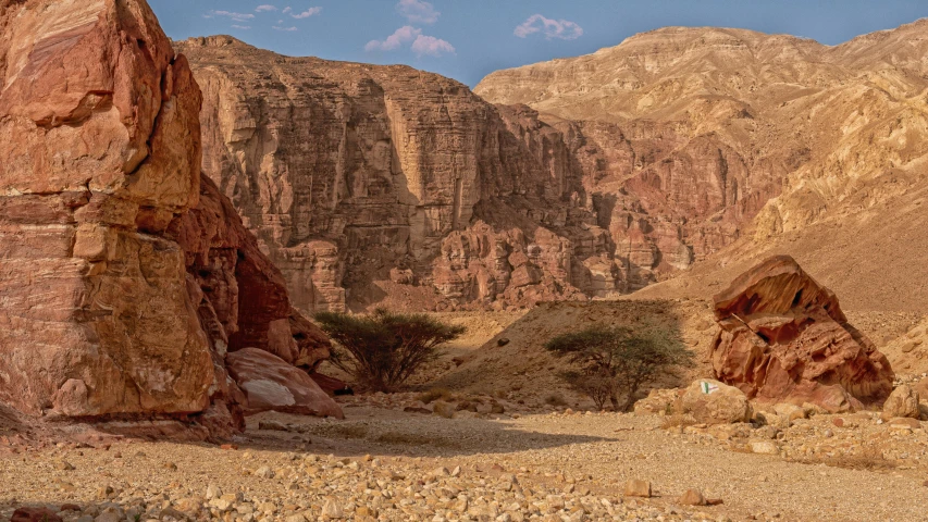 a mountain landscape with a few large rocks