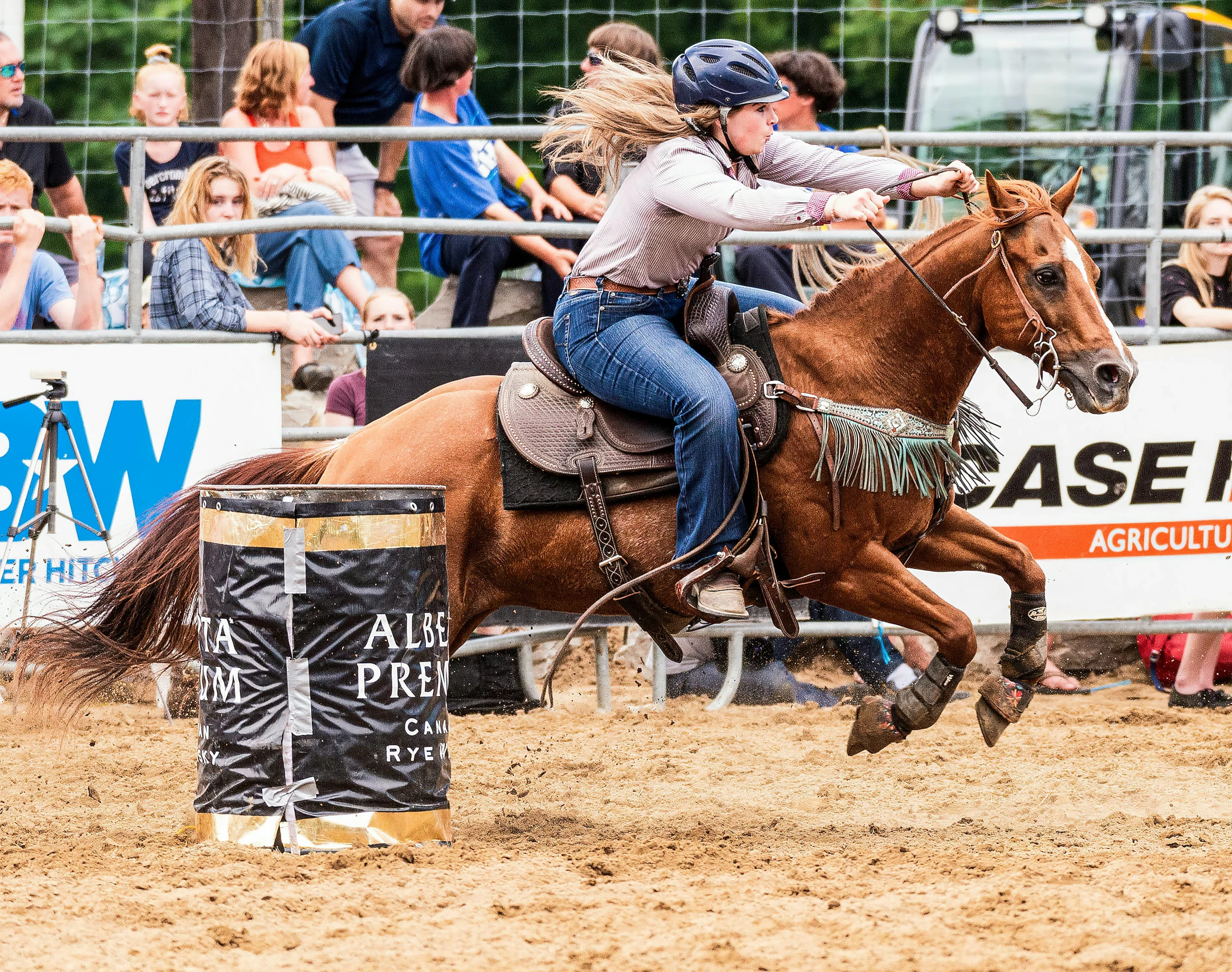 a women is riding on the back of a horse