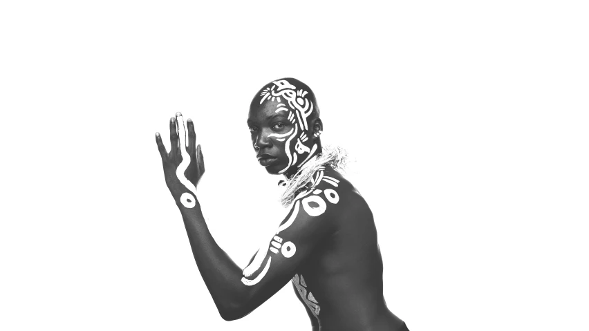 black male with body painted in traditional mexican garb