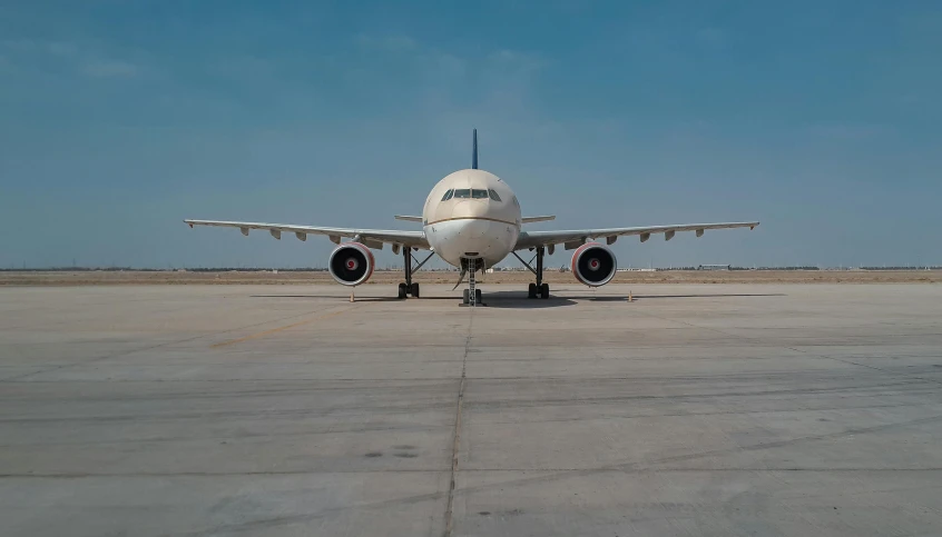 an airplane that is sitting on the runway