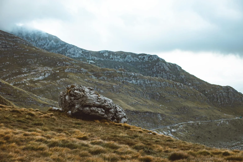 an image of a mountain with snow on the mountains