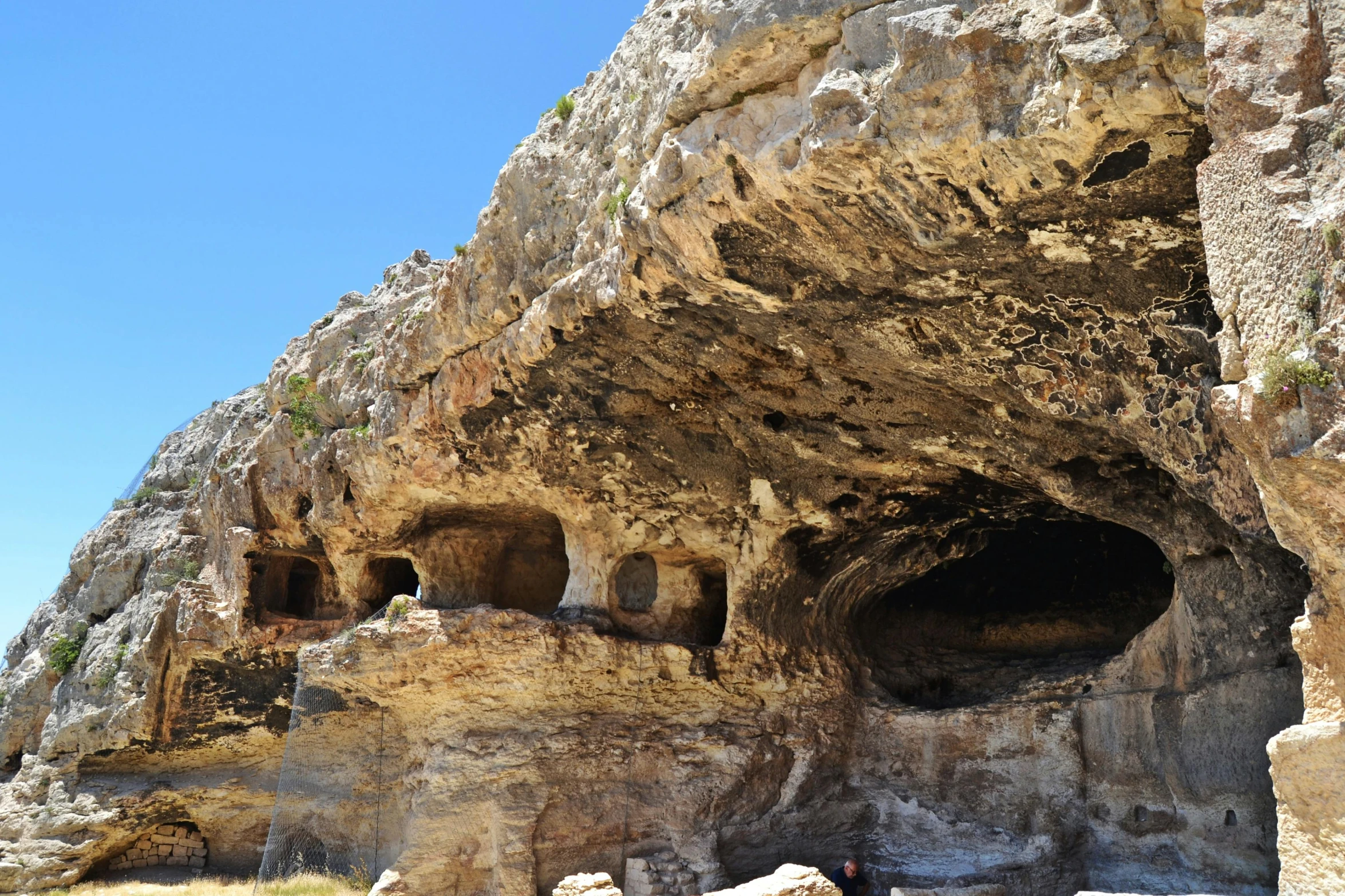 the rocks have been carved into with small structures