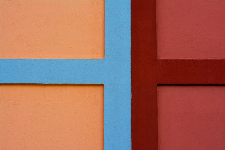 a wall with some shapes made to look like blocks