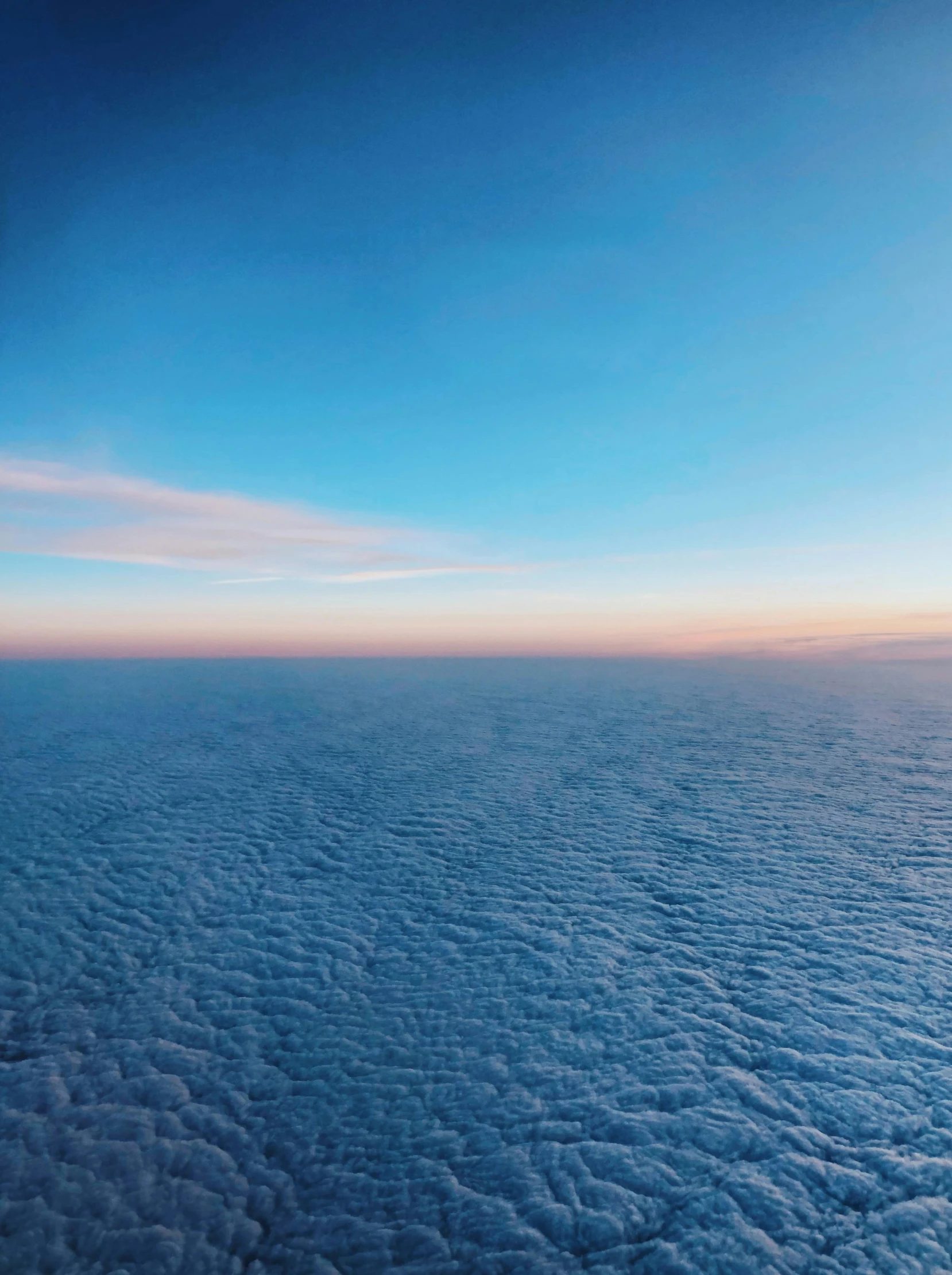 the view from an airplane of the clouds and sky