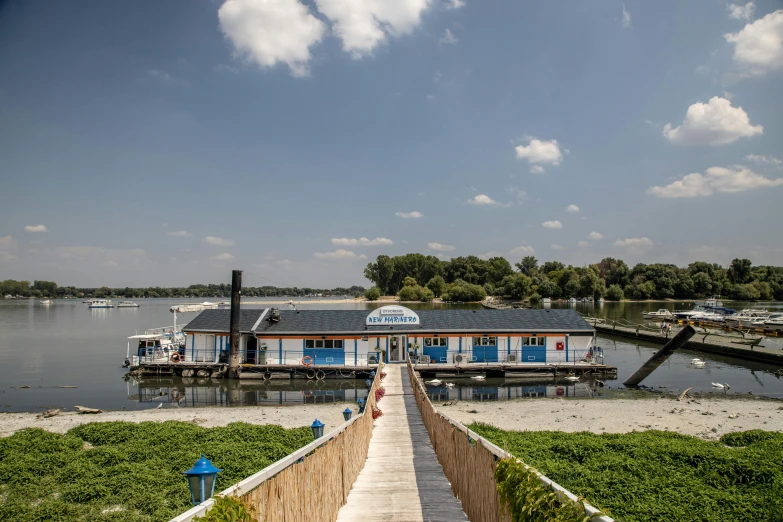 a pier with a long row of houses next to it