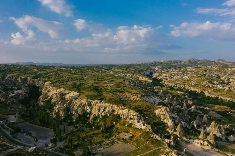 a landscape is shown as the sky looks over