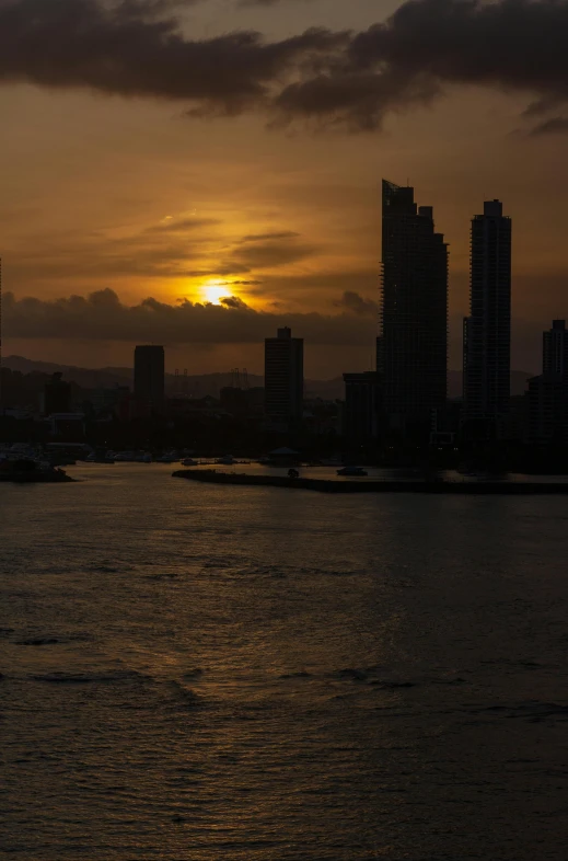 a sunset over some large body of water