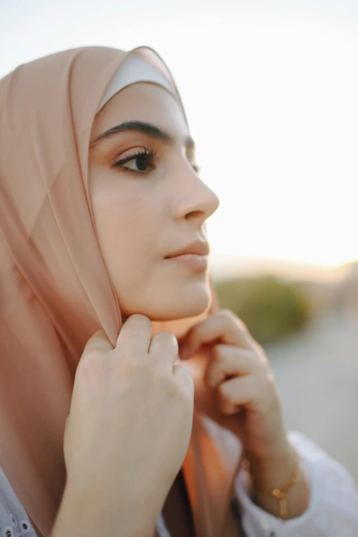 a person with a headscarf on