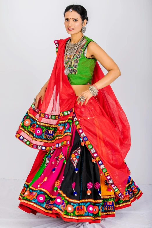 indian woman in a colorful dress posing