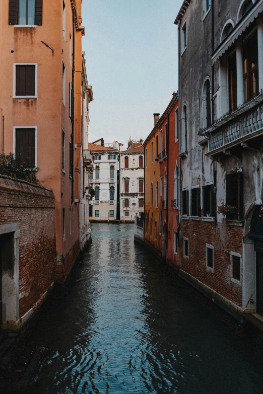 an empty canal is shown on a cloudy day