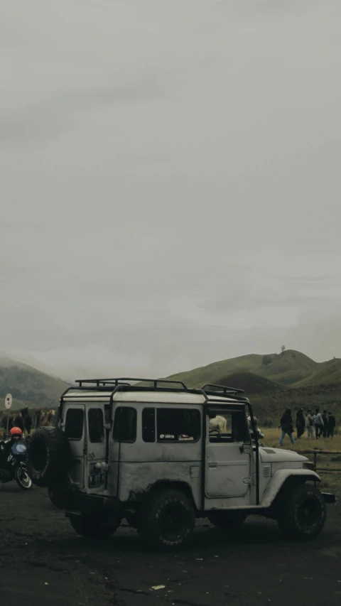 an old truck that has been sitting in the dirt