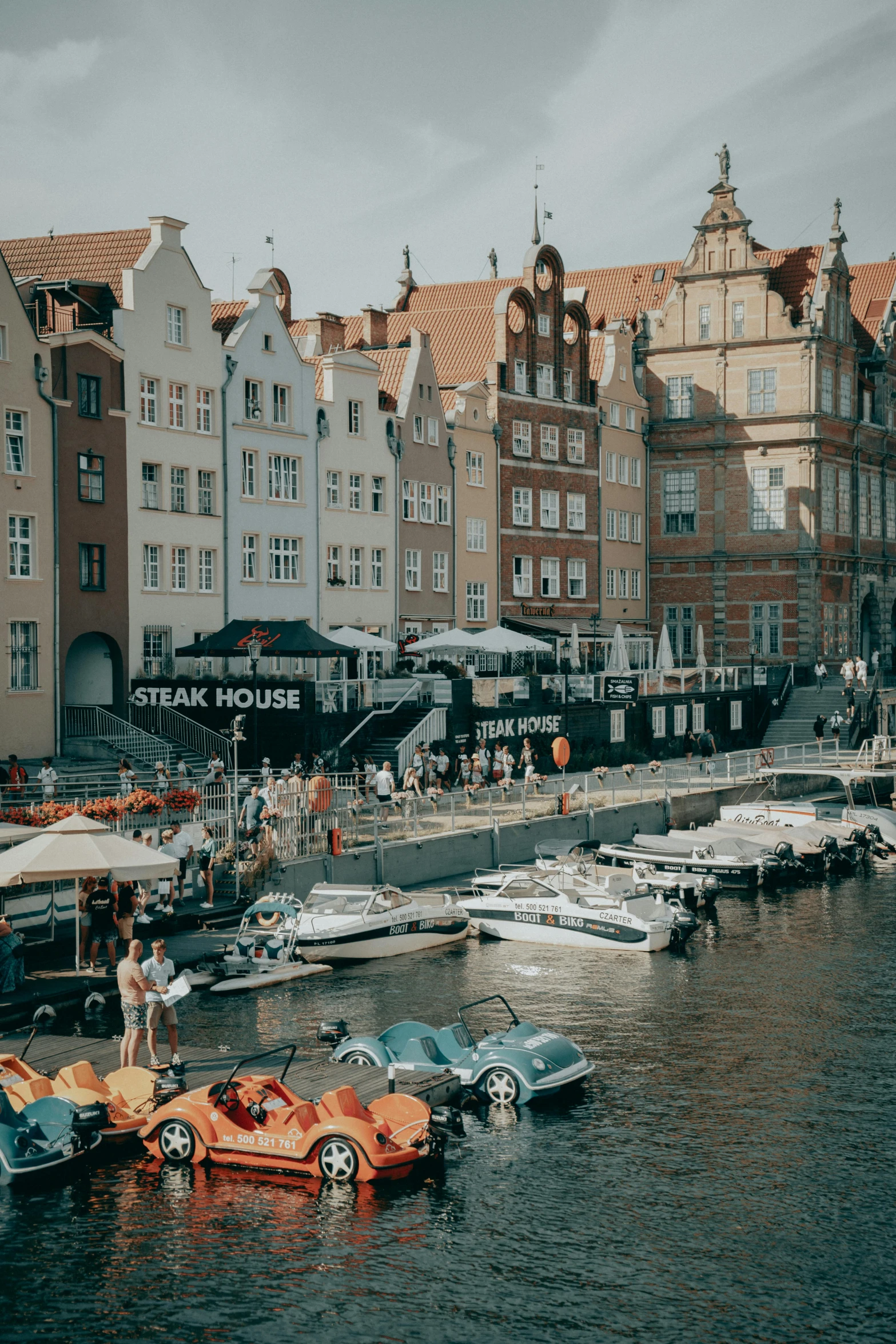 a body of water with cars in it