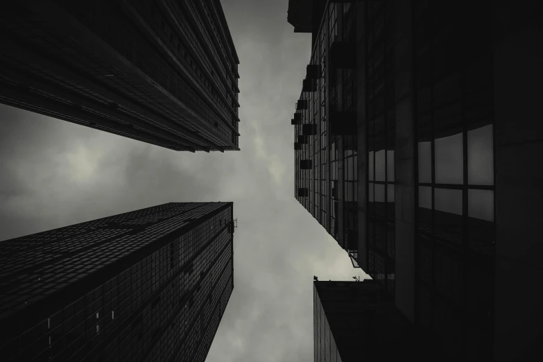 a view looking up at buildings in the distance