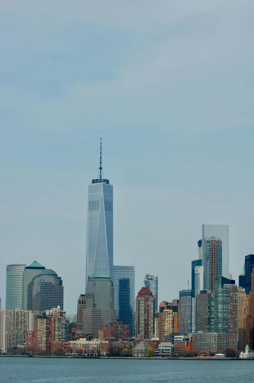 a tall building sitting on top of a river