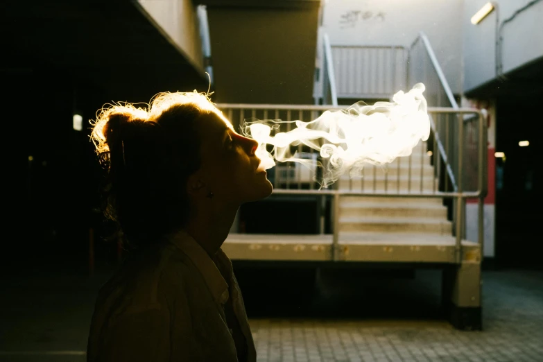 a girl blowing her lips as she walks on the street