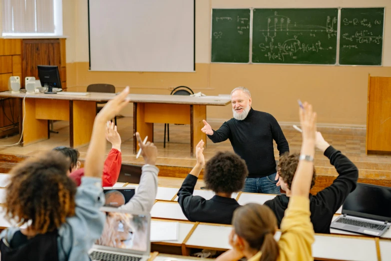 a group of children and an old man in classroom