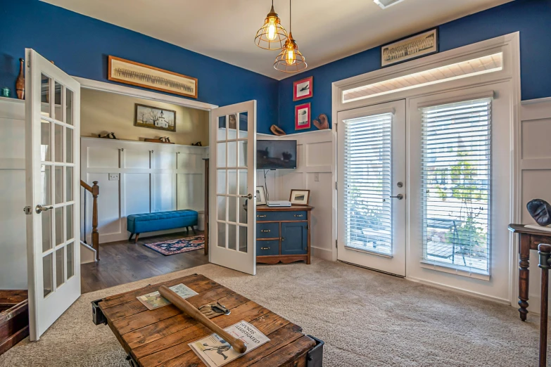 the living room has blue and white walls