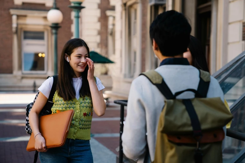  talking on cell phone while standing outside next to a man