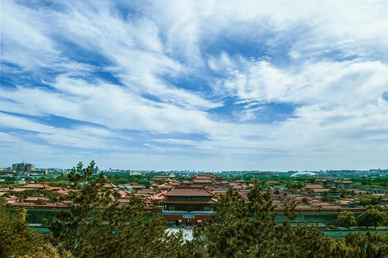 an urban landscape and clouds in the background