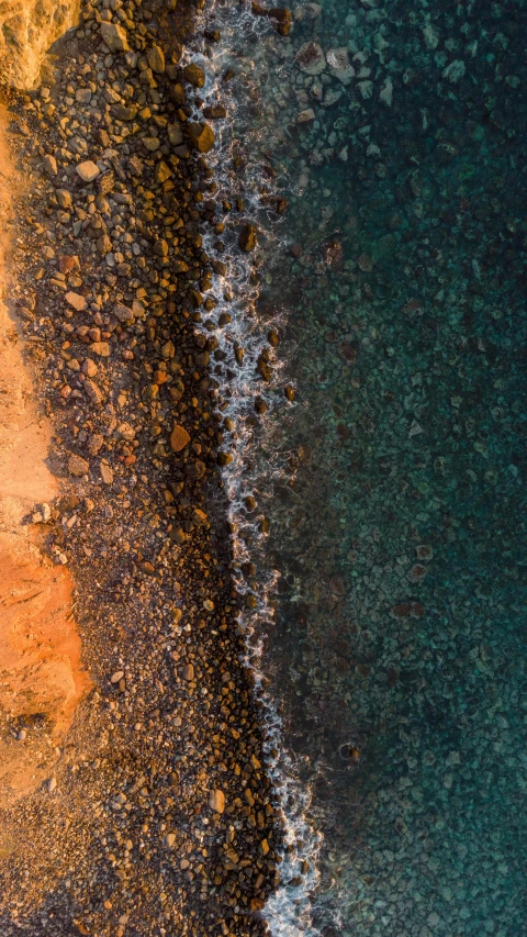 aerial view of two large seas and one small body of water