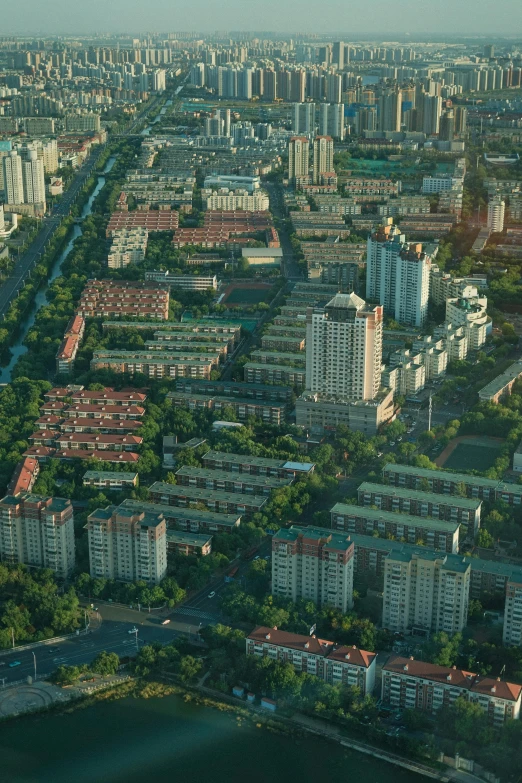 an aerial s shows a long section of city from the air