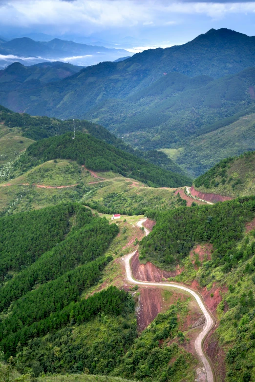 a hill with a winding road in it