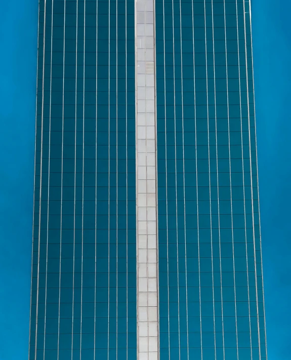 the large tall building has many windows on it