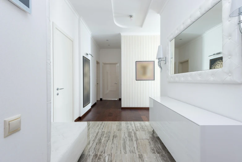 an empty hallway is shown with white walls