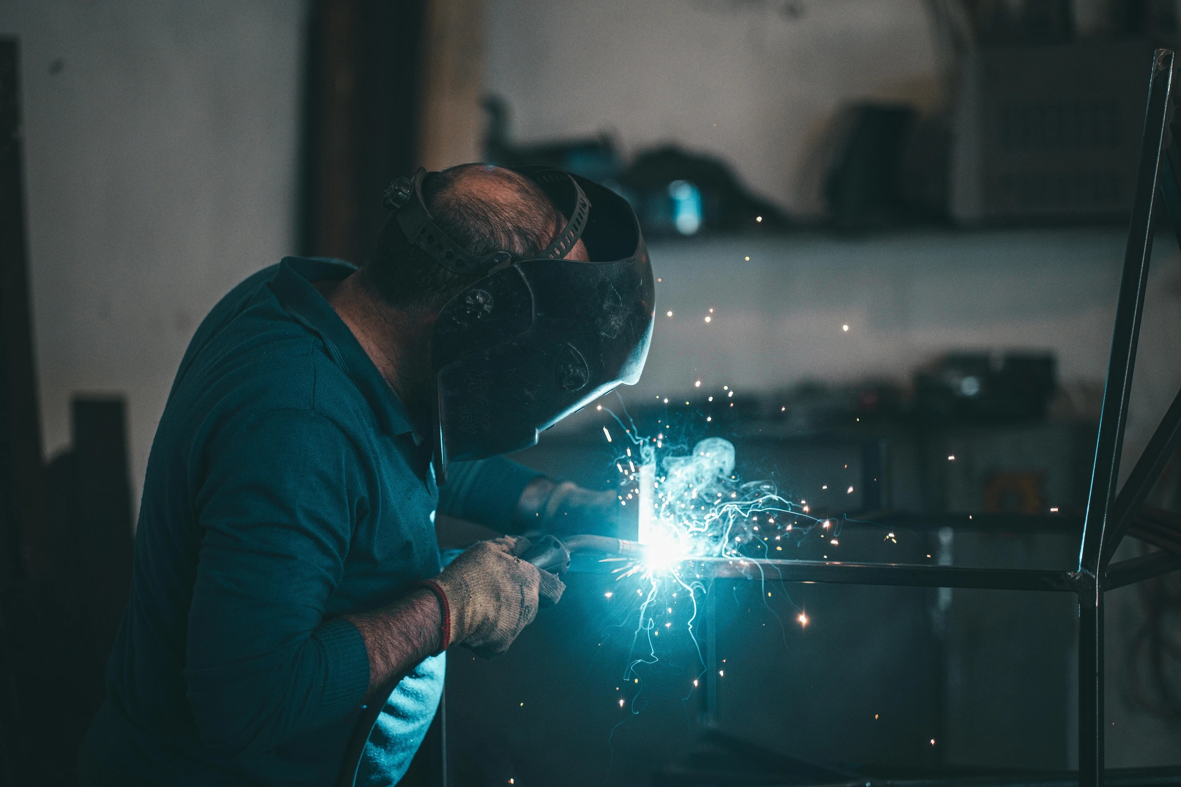 a man welding soing with a special tool